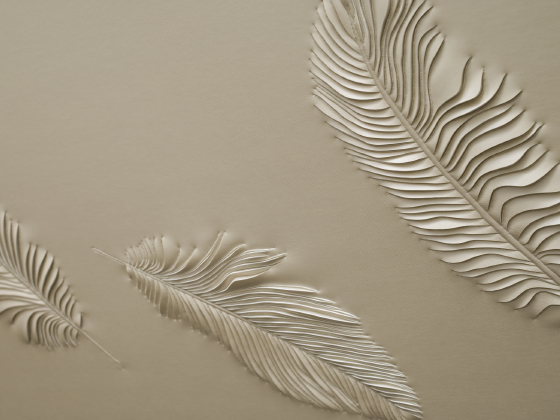 Detail of hand-sculpted artwork by Helen Amy Murray with feathers in cream faux leather